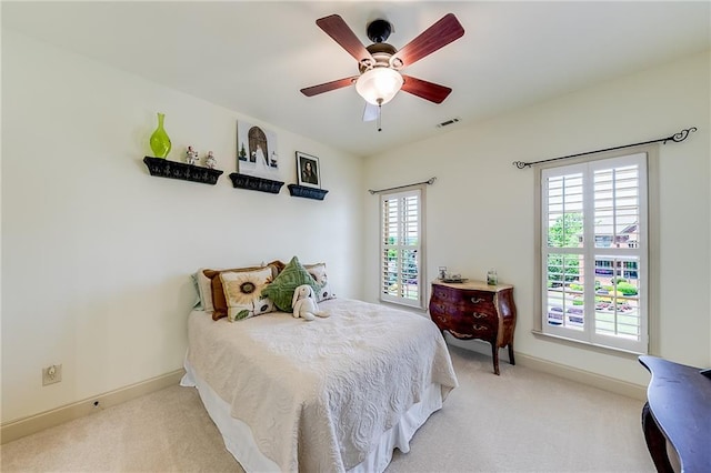 5925 Boulder Bluff Dr, Cumming, GA 30040 - bedroom with visible vents, light carpet, baseboards, connected bathroom, and a ceiling fan