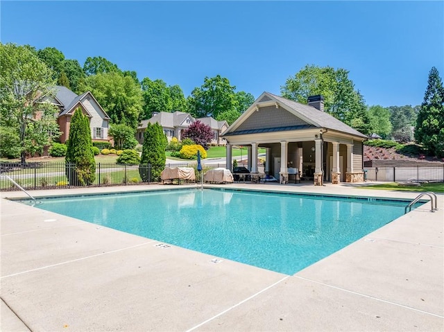5925 Boulder Bluff Dr, Cumming, GA 30040 - community pool featuring an outbuilding, a patio, a yard, and fence private yard