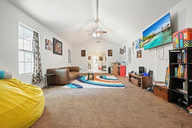 playroom featuring vaulted ceiling, carpet flooring, and a ceiling fan