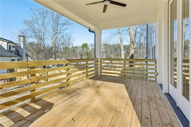 wooden deck with ceiling fan