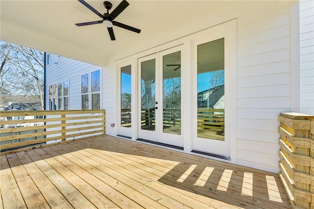 wooden deck with french doors and ceiling fan