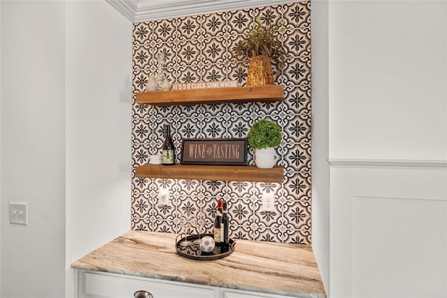 interior details with tasteful backsplash and ornamental molding