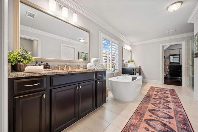 bathroom with plus walk in shower, vanity, tile patterned floors, and ornamental molding