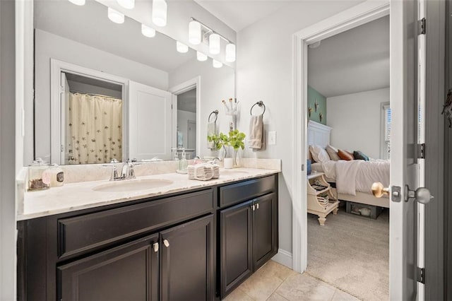 bathroom featuring tile patterned floors and vanity