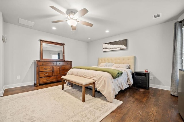 bedroom featuring ceiling fan and dark wood-type flooring