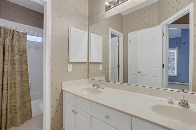 full bathroom featuring shower / bath combination with curtain, vanity, tile patterned flooring, and plenty of natural light