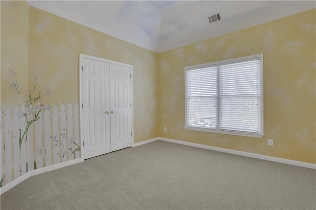 spare room featuring carpet flooring