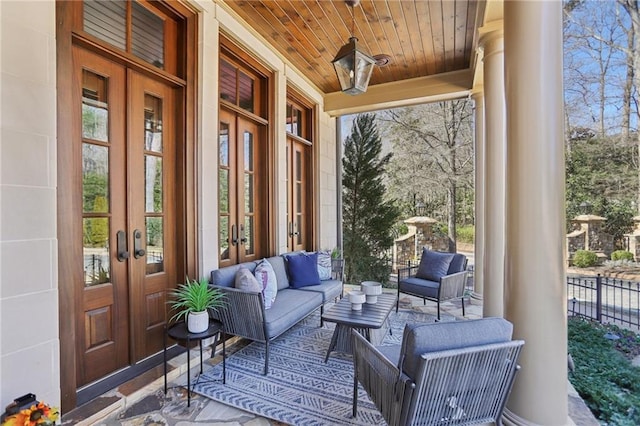 view of patio / terrace with an outdoor hangout area and french doors