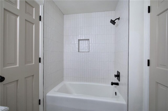 full bathroom with shower / washtub combination