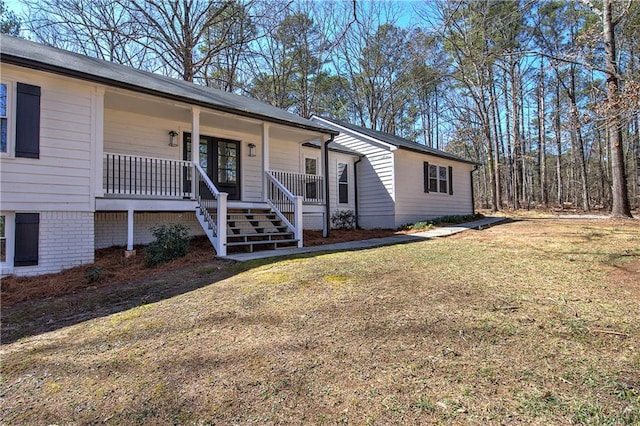 ranch-style home with a porch, a front yard, and stairs