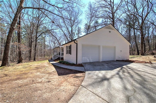 view of property exterior with a garage