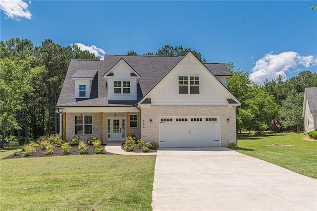 4075 O Henry Ct, Mcdonough, GA 30252 - view of front of property featuring concrete driveway, a front lawn, brick siding, and french doors