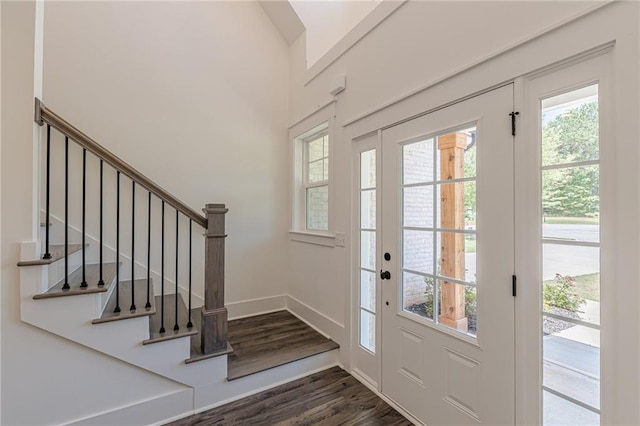 4075 O Henry Ct, Mcdonough, GA 30252 - foyer entrance featuring dark wood finished floors, stairs, and baseboards