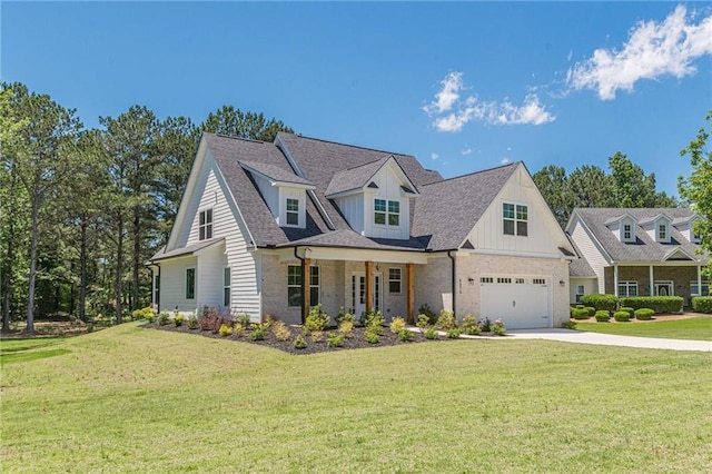 4075 O Henry Ct, Mcdonough, GA 30252 - view of front facade featuring concrete driveway, a front lawn, a garage, board and batten siding, and brick siding