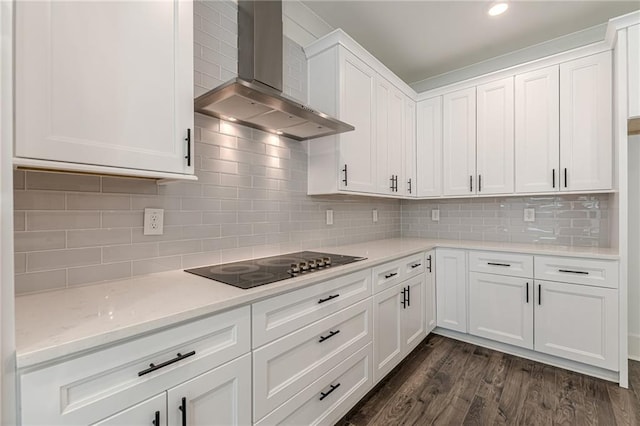 4075 O Henry Ct, Mcdonough, GA 30252 - kitchen featuring wall chimney range hood, black electric cooktop, white cabinets, backsplash, and recessed lighting