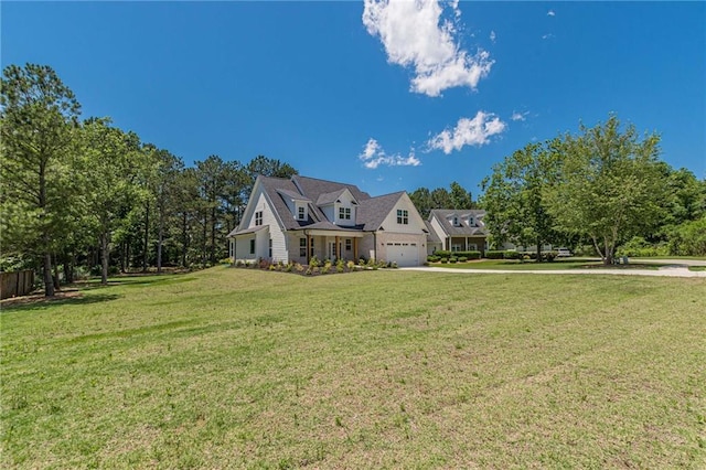4075 O Henry Ct, Mcdonough, GA 30252 - cape cod-style house with a front lawn, an attached garage, and driveway