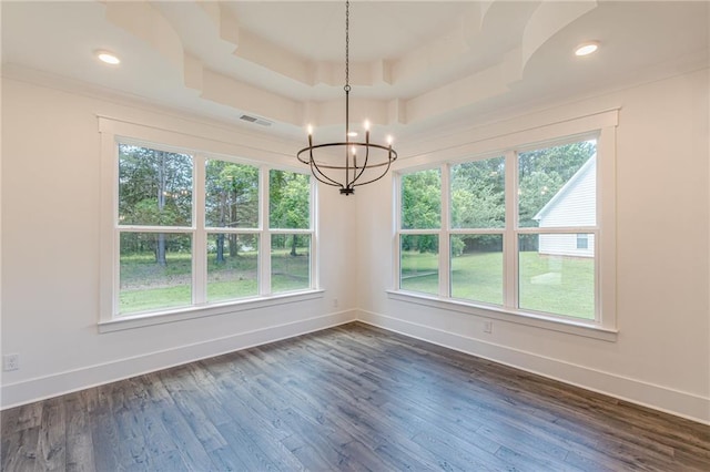 4075 O Henry Ct, Mcdonough, GA 30252 - unfurnished dining area with a chandelier, baseboards, dark wood-style floors, a raised ceiling, and recessed lighting