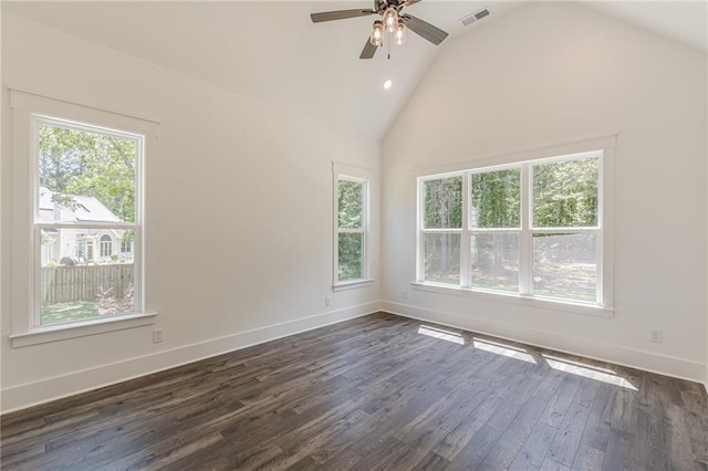 4075 O Henry Ct, Mcdonough, GA 30252 - spare room featuring plenty of natural light, dark wood-type flooring, ceiling fan, lofted ceiling, and baseboards