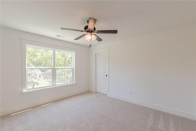 4075 O Henry Ct, Mcdonough, GA 30252 - unfurnished room featuring light colored carpet, a ceiling fan, and baseboards
