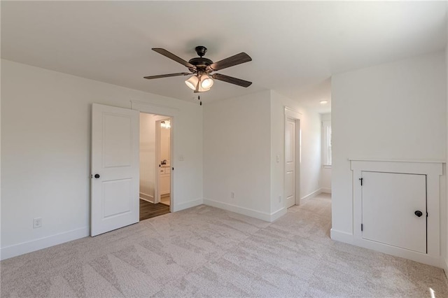 4075 O Henry Ct, Mcdonough, GA 30252 - empty room with a ceiling fan, light carpet, baseboards, and attic access