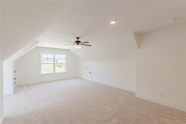 4075 O Henry Ct, Mcdonough, GA 30252 - additional living space with light colored carpet, ceiling fan, lofted ceiling, baseboards, and recessed lighting