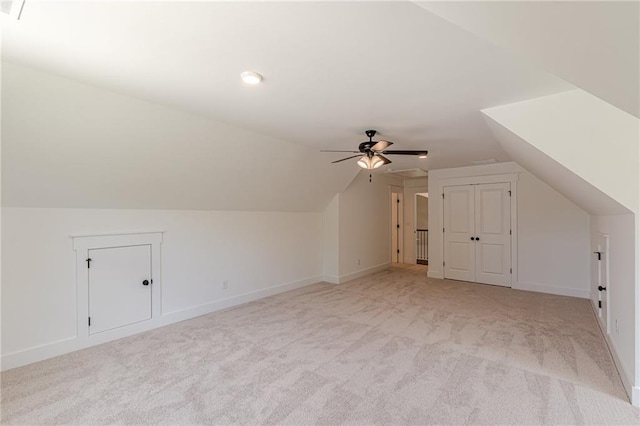 4075 O Henry Ct, Mcdonough, GA 30252 - bonus room featuring light carpet, lofted ceiling, a ceiling fan, and baseboards