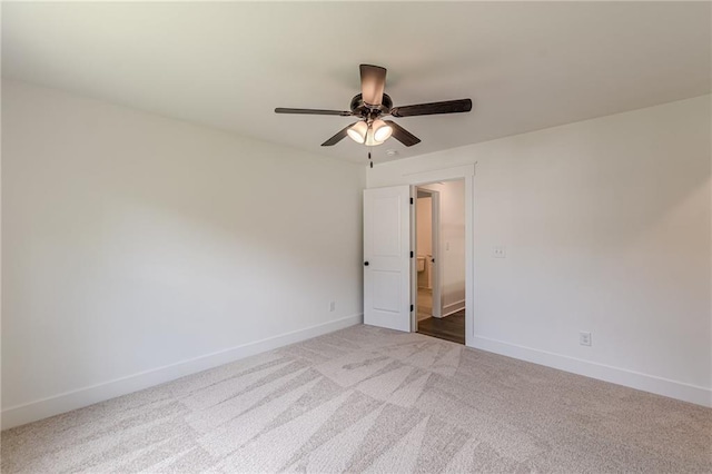 4075 O Henry Ct, Mcdonough, GA 30252 - empty room featuring a ceiling fan, carpet floors, and baseboards