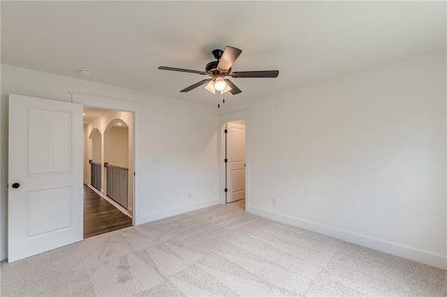 4075 O Henry Ct, Mcdonough, GA 30252 - unfurnished bedroom with carpet floors, baseboards, and a ceiling fan