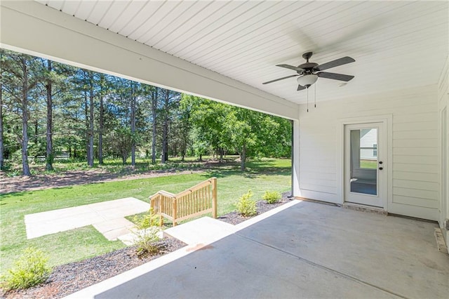 4075 O Henry Ct, Mcdonough, GA 30252 - view of patio / terrace with ceiling fan and view of wooded area