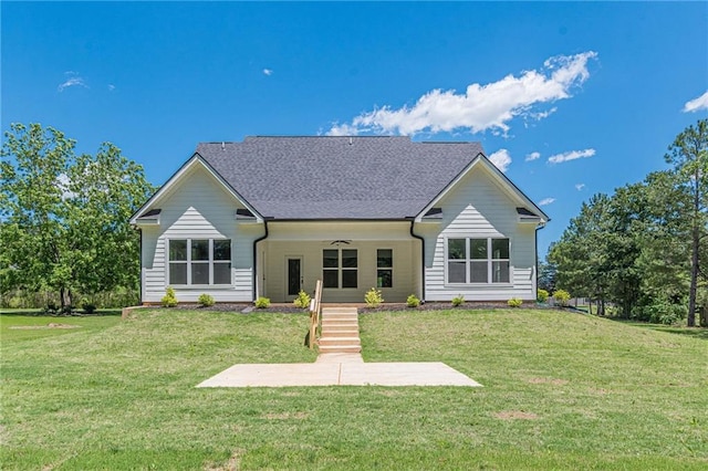4075 O Henry Ct, Mcdonough, GA 30252 - view of front of house with a front lawn, a ceiling fan, and a shingled roof