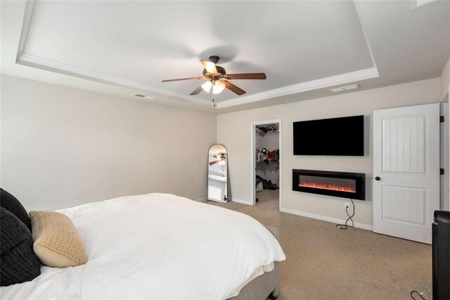 3406 Pennington Dr, Lithonia, GA 30038 - bedroom with a tray ceiling, carpet floors, and baseboards