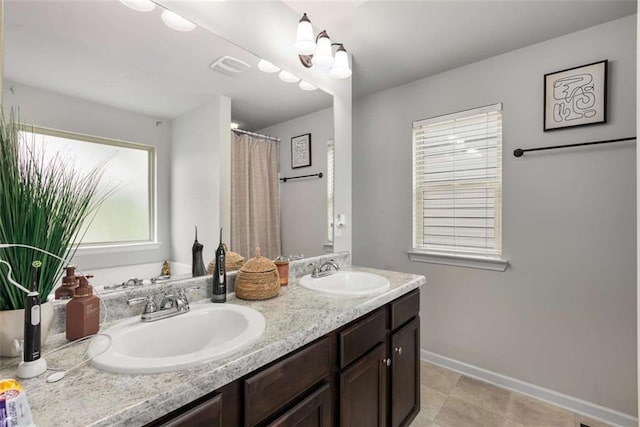 3406 Pennington Dr, Lithonia, GA 30038 - full bathroom with baseboards and double vanity