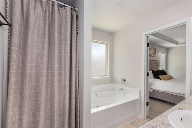 3406 Pennington Dr, Lithonia, GA 30038 - full bath featuring ensuite bathroom, a bath, and a sink