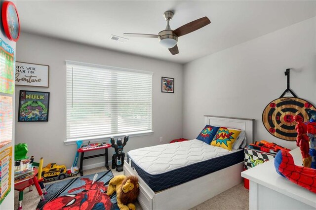 3406 Pennington Dr, Lithonia, GA 30038 - bedroom featuring carpet and a ceiling fan