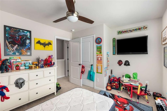 3406 Pennington Dr, Lithonia, GA 30038 - bedroom with light colored carpet, ceiling fan, and baseboards