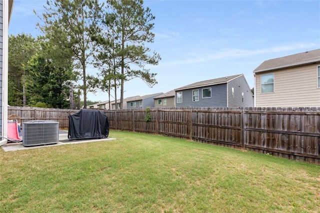 3406 Pennington Dr, Lithonia, GA 30038 - view of yard featuring central AC unit and a residential view