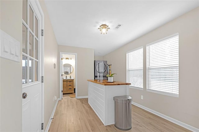 hall featuring light hardwood / wood-style flooring