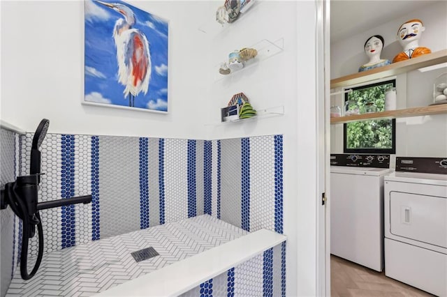 laundry area featuring washer and clothes dryer