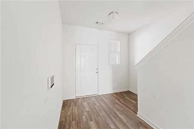 entryway with wood-type flooring