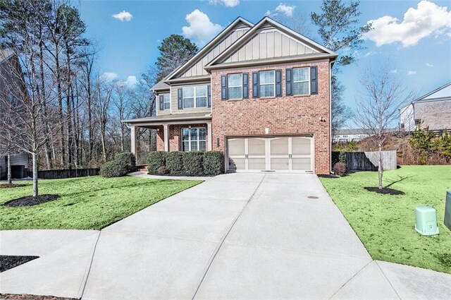 view of front of property with central AC unit, a front lawn, and a garage