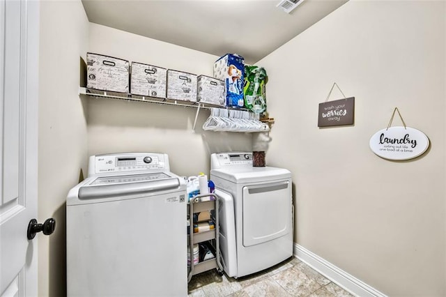 washroom with separate washer and dryer