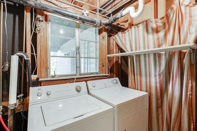 laundry room with washing machine and dryer