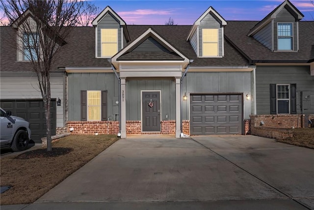 new england style home with a garage