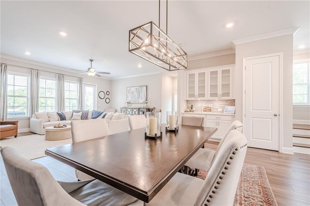 5005 Shay Town Ln, Peachtree Corners, GA 30092 - dining area featuring recessed lighting, ornamental molding, and light wood-style flooring