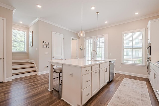 5005 Shay Town Ln, Peachtree Corners, GA 30092 - kitchen featuring white cabinets, a sink, a kitchen island with sink, dark wood-type flooring, and stainless steel dishwasher