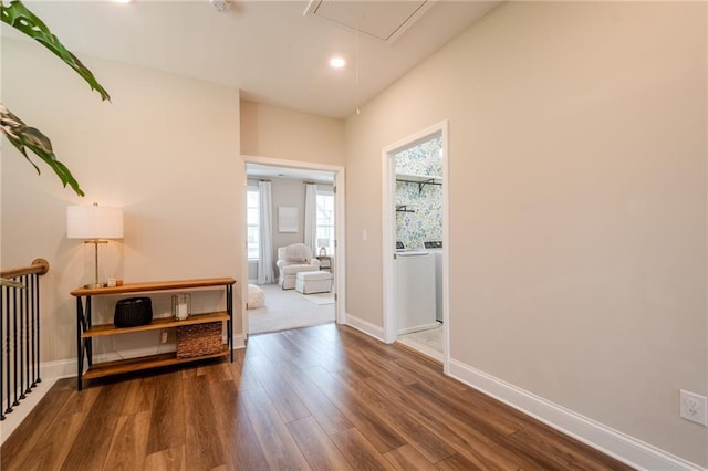 5005 Shay Town Ln, Peachtree Corners, GA 30092 - corridor with baseboards, washer / clothes dryer, attic access, and wood finished floors