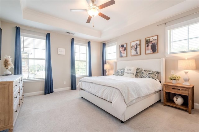 5005 Shay Town Ln, Peachtree Corners, GA 30092 - bedroom with a tray ceiling, visible vents, light carpet, and baseboards