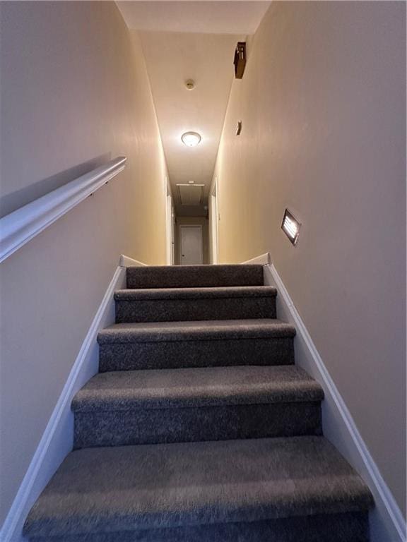 stairway with baseboards