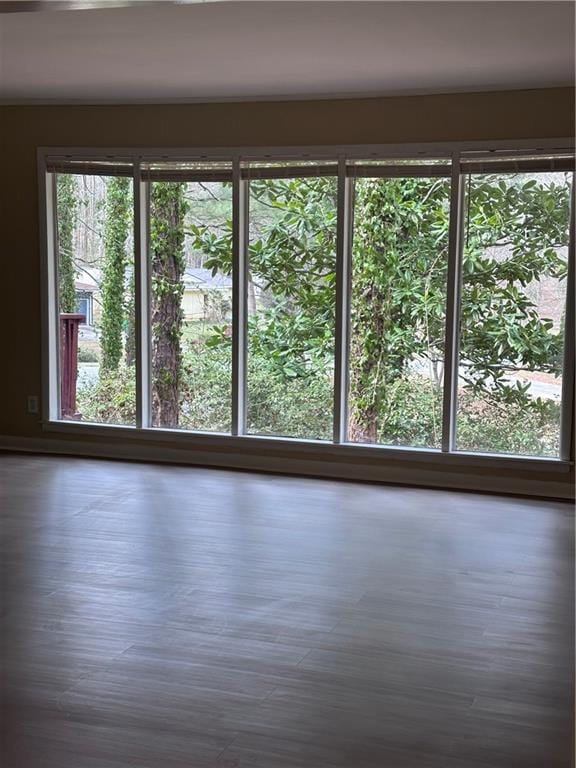 empty room with wood finished floors