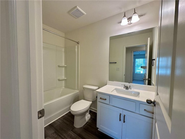 544 Magnolia Cir, Palmetto, GA 30268 - bathroom featuring vanity, wood finished floors, and shower / washtub combination
